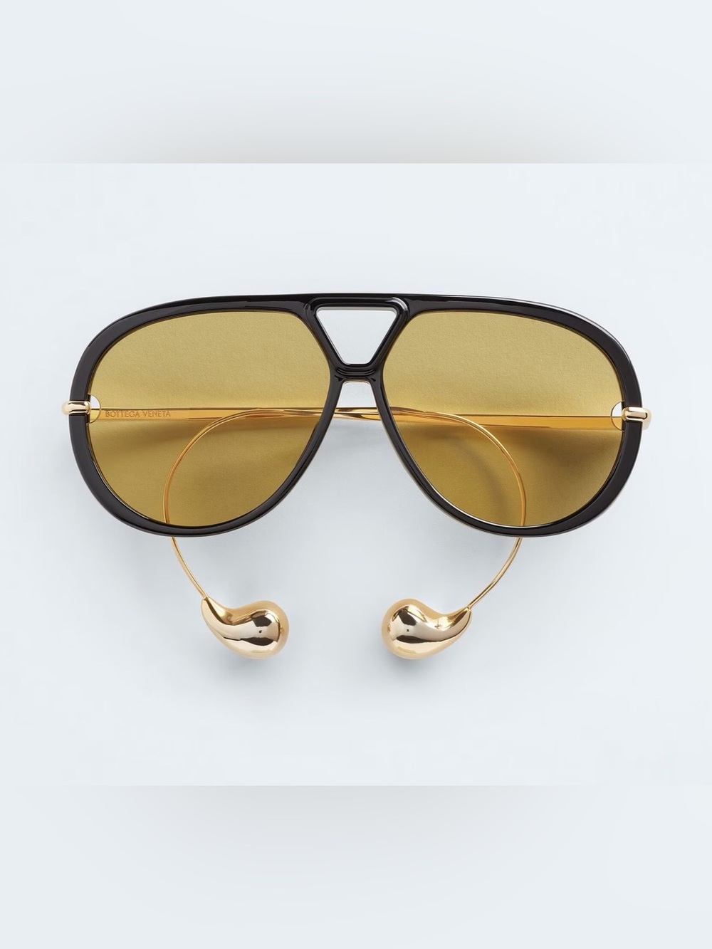 Bottega Veneta Black Frame Sunglasses with Yellow Lenses and Gold Accents